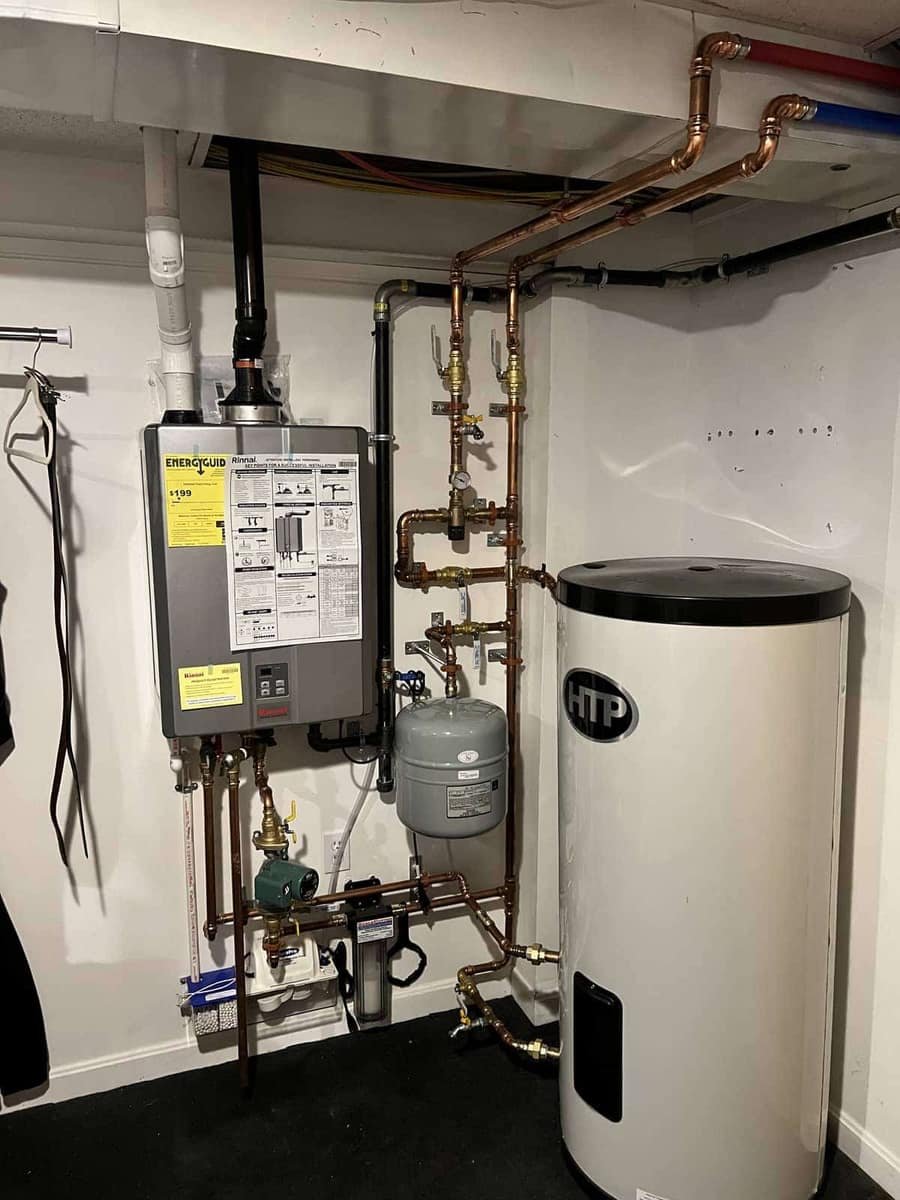 Tankless water heater and indirect tank with new copper piping installed by Precision Plumbing Solutions in Lynnfield, MA
