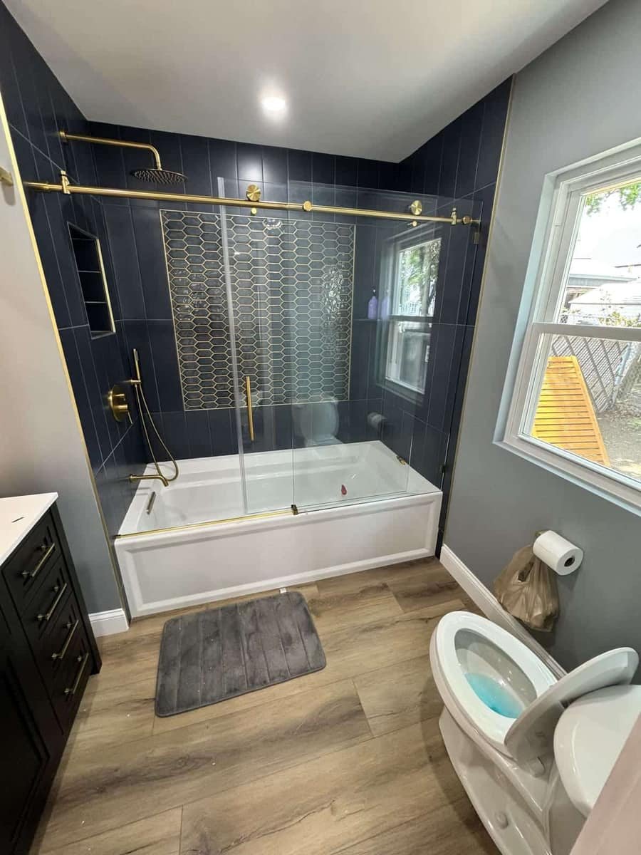 Tub-shower combo with brass trim — Precision Plumbing Solutions
