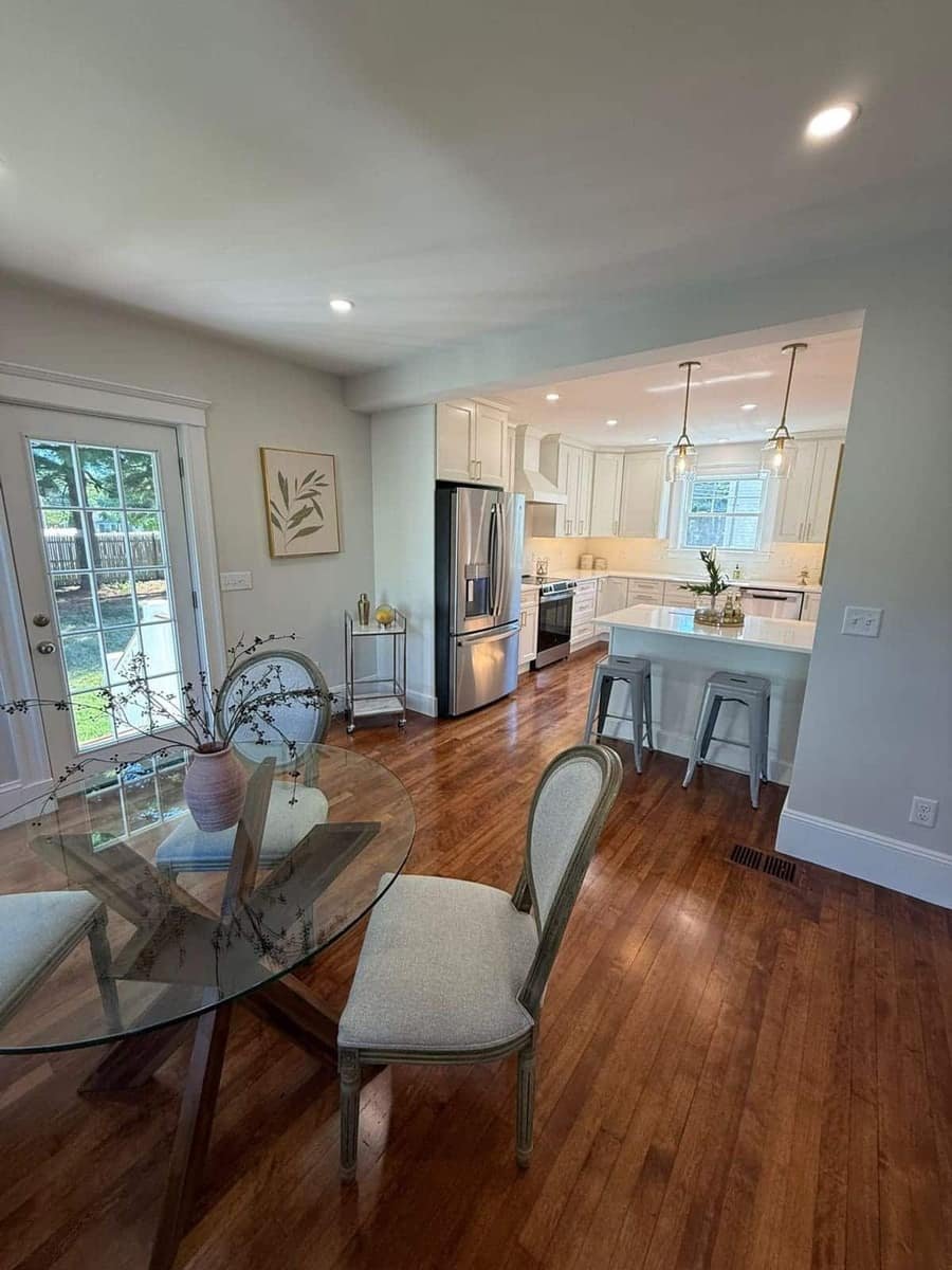 Open-plan kitchen with new sink and gas range lines — Precision Plumbing Solutions